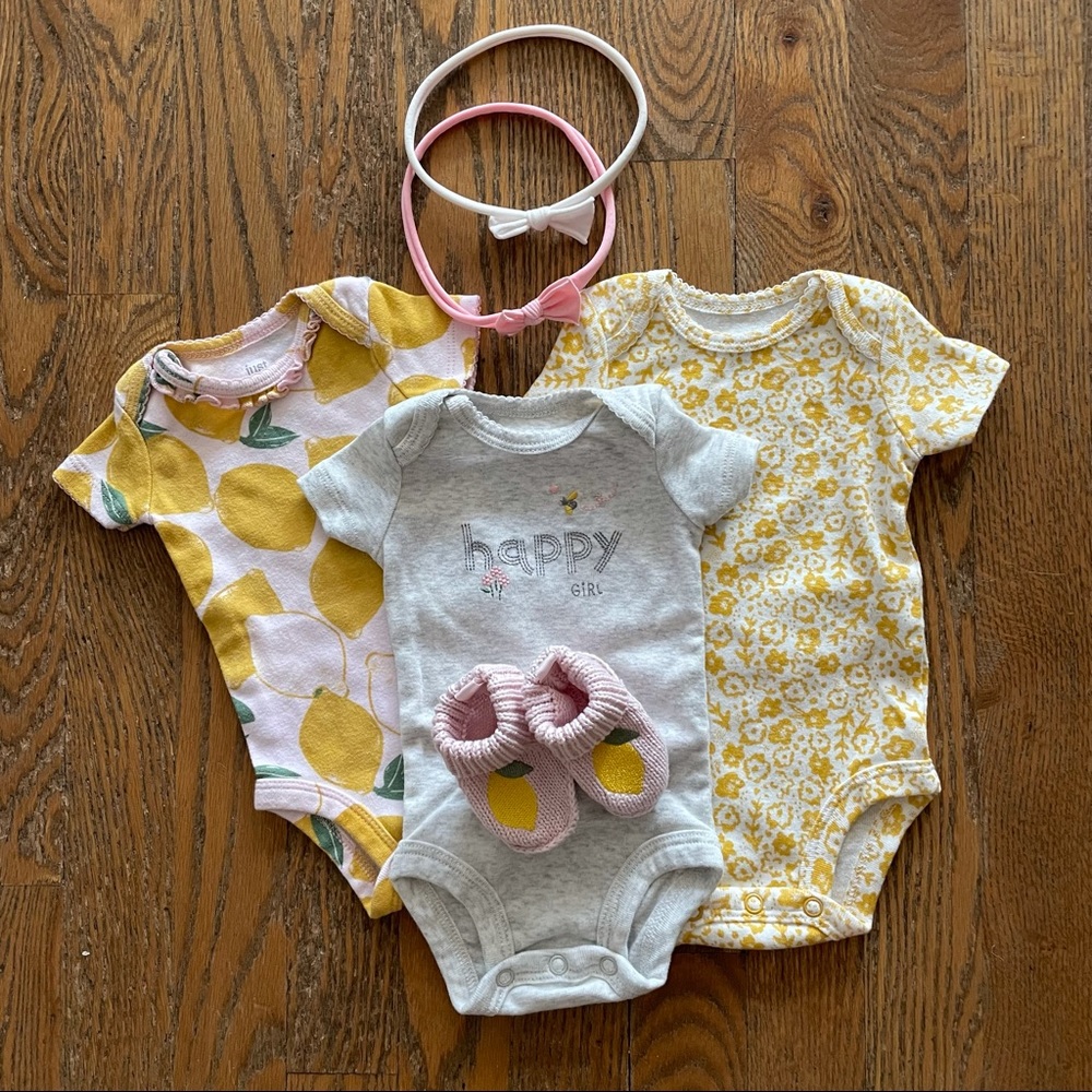 Carter’s newborn onesie set